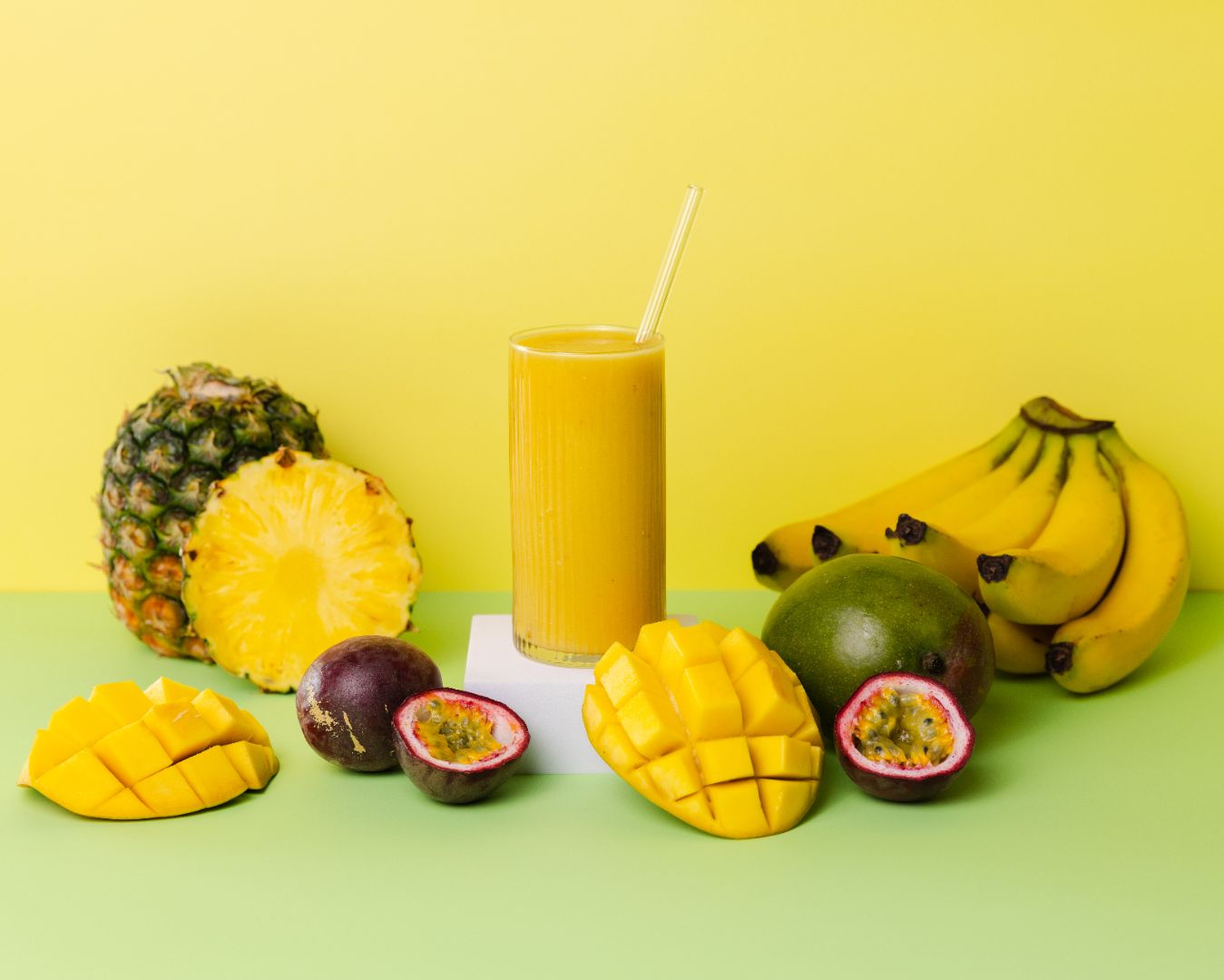 Healthy smoothie made with Reboot ready-to-blend pack and ingredients on table